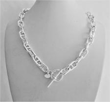 Sterling silver anchor chain necklace 10mm. T-bar closure. Length: 22 inch. 